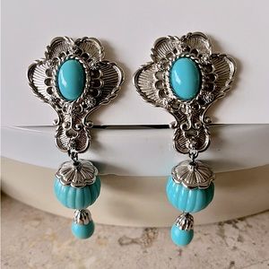 Turquoise & silver clip on earrings. Original $65, sell for$30.
